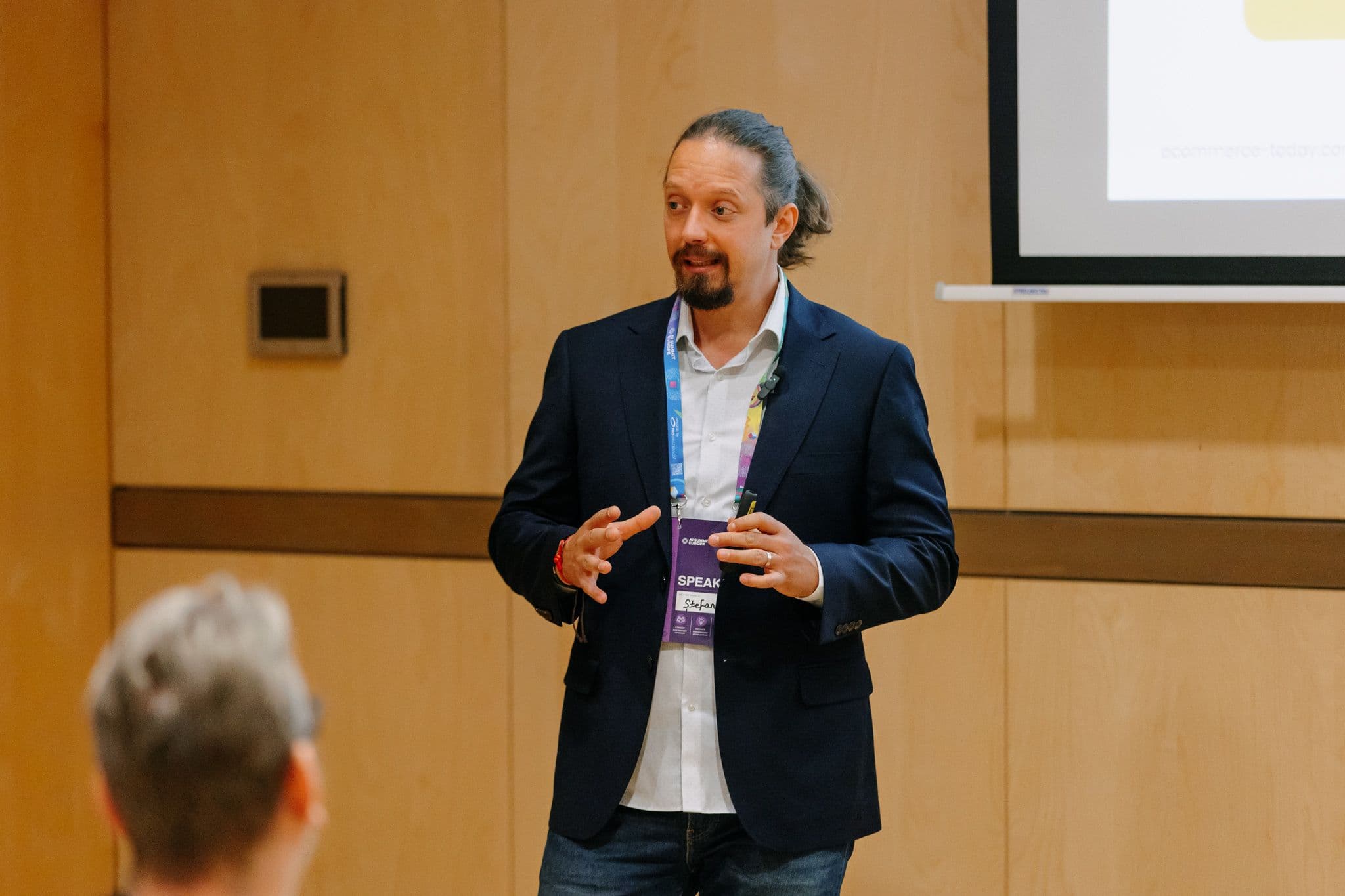 Stefan Chiriacescu speaking at AI Summit Europe 2026.